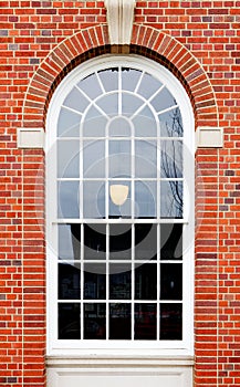 Arched window brick wall