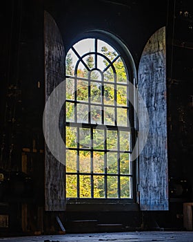 Arched window in the historic Weston village playhouse