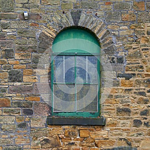 Arched window on old building
