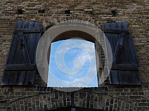 Arched window overlooking the sky