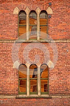 Arched windows in a Victorian building