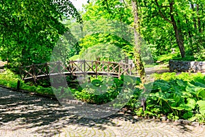 Arched wooden bridge in Sofiyivka park in Uman, Ukraine