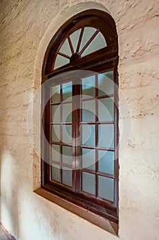 Arched wooden window of Thibaw Palace  Thiba Palace  in Ratnagiri,