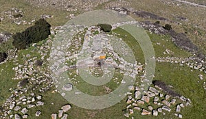 Archeological ruins of Nuragic necropolis Giants Tomb of S’omu de S’orcu - Tomba di Giganti Omu de Orcu