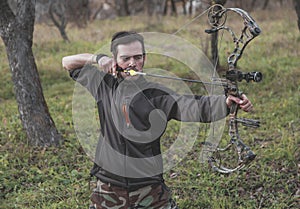 Archer shooting compound bow