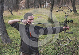 Archer shooting compound bow