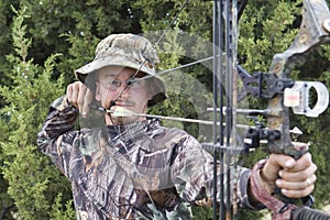 Archery hunter with bow