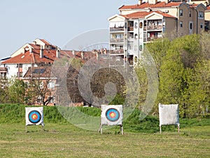 Archery target, also called bullseye target, in an archers field, used for practicing archery, outdoors photo