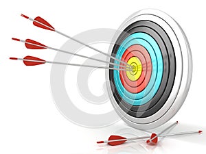 Archery target with red arrows in the center