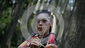 Archery women haunted an enemy with scared them with arrows and a bow