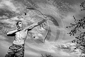 Archery. Young archer training with the bow