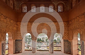 Arches with Arabic patternes inside famous from 14th century, Alhambra medieval fortress