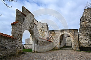 Arches in the castle ruin Hellenstein on the hill of Heidenheim an der Brenz in southern Germany against a blue sky with clouds, photo