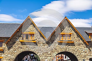 Arches connecting main square and Mitre street near Civic Center in downtown Bariloche - Bariloche, Patagonia, Argentina