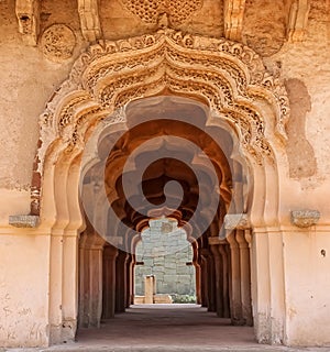 Arches of lotus temple in the ancient ruins of Hampi