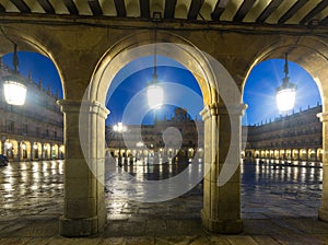Arches at Plaza Mayor at Salamanca in evening photo