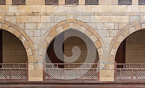 Arches with wooden balustrades, caravanserai Wikala of al-Ghuri, Cairo, Egypt