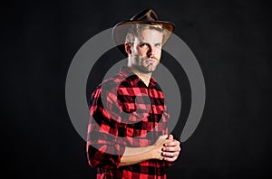 Archetypal image of Americans abroad. Masculinity and brutality concept. Adopt cowboy mannerisms as a fashion pose photo