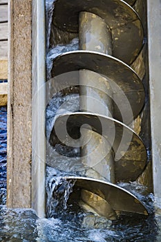 The Archimedes screw, Archimedean screw or screwpump, is a machine historically used for transferring water from a low-lying body