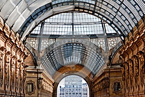 The arching glass and cast iron roof of Galleria Vittorio Emanuele II in Milan, Italy.