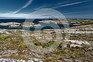 Archipelag view of the coastal granite mountains and high ground of the Trondelag island Hitra, Froya, Fosen. The Norwegian North photo