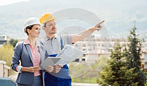 Architect and builder developing ideas for construction project