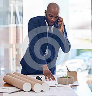 Architect, business and black man on phone call and blueprint, communication and contact with networking or phone