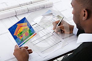 Architect Calculating Heat Temperature