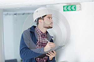 architect checking insulation during house construction