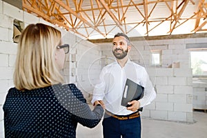 Architect and civil engineer at the construction site.