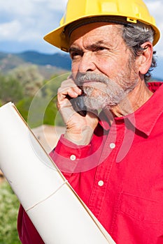 Architect, Contractor with Yellow Hardhat outdoor portrait