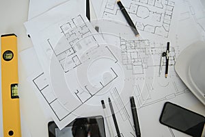 architect design working drawing sketch plans blueprints and making architectural construction model in architect studio