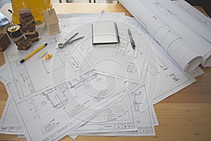Architect desk ,Business,engineering concept,construction site, soft focus, vintage tone, working with blueprints in the office.