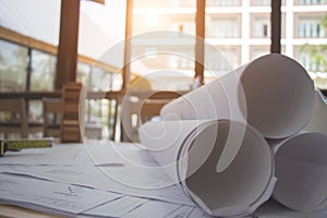 Architect desk ,Business,engineering concept,construction site, soft focus, vintage tone, working with blueprints in the office.