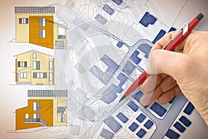 Architect drawing a new residential building over an imaginary cadastral map