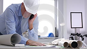 Architect Engineer Businessperson Talk to Mobile Read and Write Technical Plans
