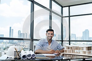 Architect engineer drawing blueprint with project plan. Front view. Tracery