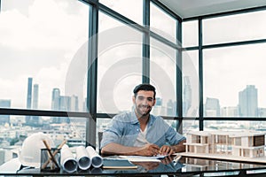 Architect engineer drawing blueprint with project plan. Front view. Tracery