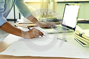 architect or engineer working on table show work