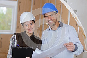 architect and female foreman posing