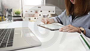 Architect female working digital tablet drawing architecture project