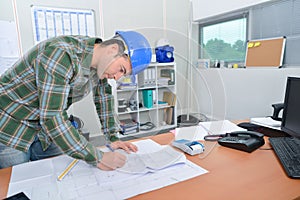 Architect at his desk