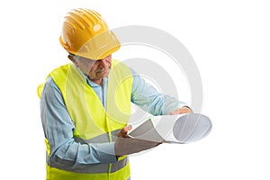 Architect looking at paper with plans