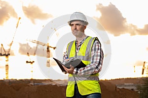 Architect man holding a project book plan