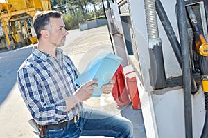 architect outdoors working construction site concept