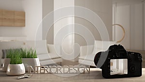 Architect photographer designer desktop concept, camera on wooden work desk with screen showing interior design project, blurred