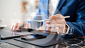 Architect presenting house design concept using digital interface and modern technology for property development and real estate