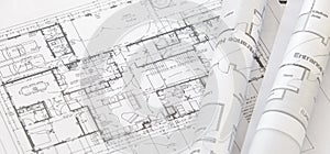 Close - up Architect rolls and architectural plan ,technical project drawing photo