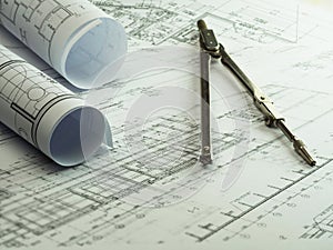 Architect rolls and plans with divider. Architectural plan, tech