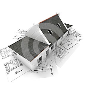 Architectï¿½s model house on top of blueprints